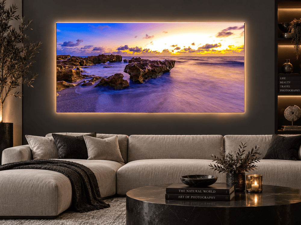 Twilight Hour coastal landscape photograph displayed as Luchae illuminated fine art, featuring dramatic rocks, ocean water and a colorful glowing sunset.