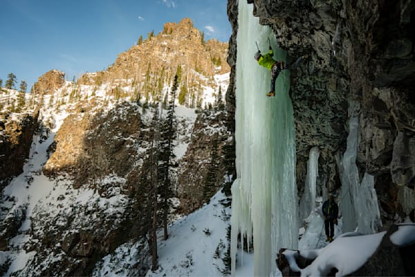 Drew Smith getting his stretchy on while ascending a route called; Alex and Wonderland with Jack Kramer in  Hyalite Canyon, Apsaalooke (Crow) Salish Kootenai (Flathead) and Cheyenne
