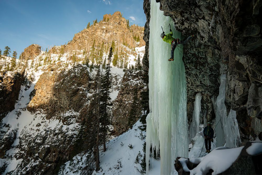 Drew Smith getting his stretchy on while ascending a route called; Alex and Wonderland with Jack Kramer in  Hyalite Canyon, Apsaalooke (Crow) Salish Kootenai (Flathead) and Cheyenne