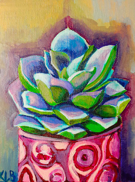 Succulent In Pink Vase