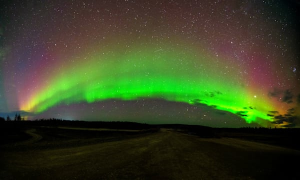 Vibrant Aurora Borealis Rainbow in Starry Night Sky