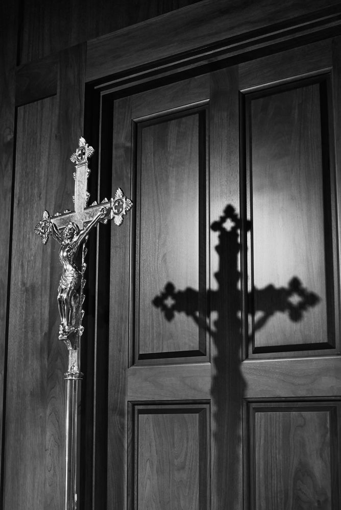 Sanctified Shadows: Black and White Crucifix Photography by Jason Poblete