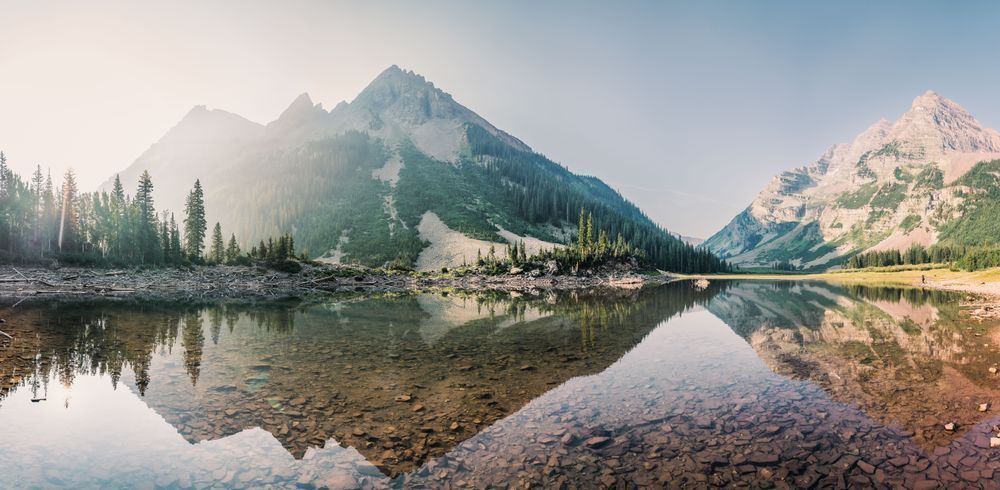 Pyramid and Bells reflecting in Crater Lake