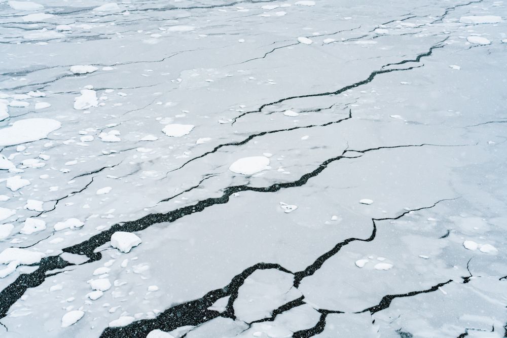 Cracks in Time | Antarctic Sea Ice Abstract Photography
