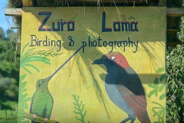 Welcome sign at Zuro Loma Preserve, a high-elevation cloud forest birding reserve near Quito, Ecuador