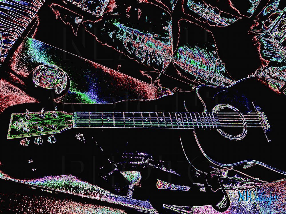 "A Glow Guitar Awaits Invisible Player"