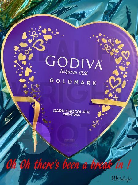 Godiva Gold Mark Purple Heart Chocolates Break In Art | NAS Ventures dba as Neal Wright Photography