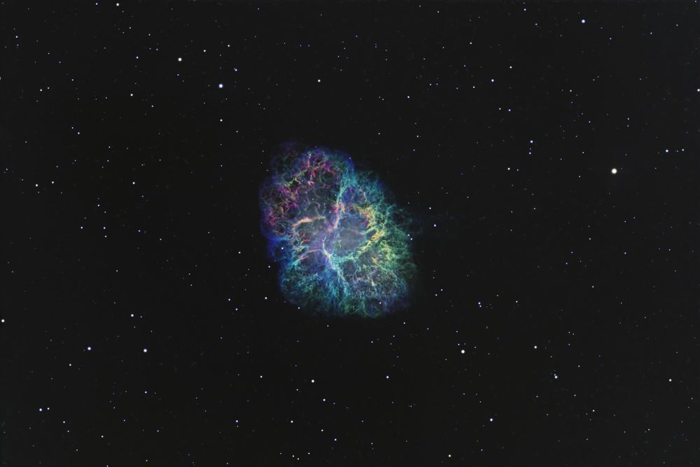 Cosmic Explosion: Crab Nebula - Vibrant Cosmic Photograph