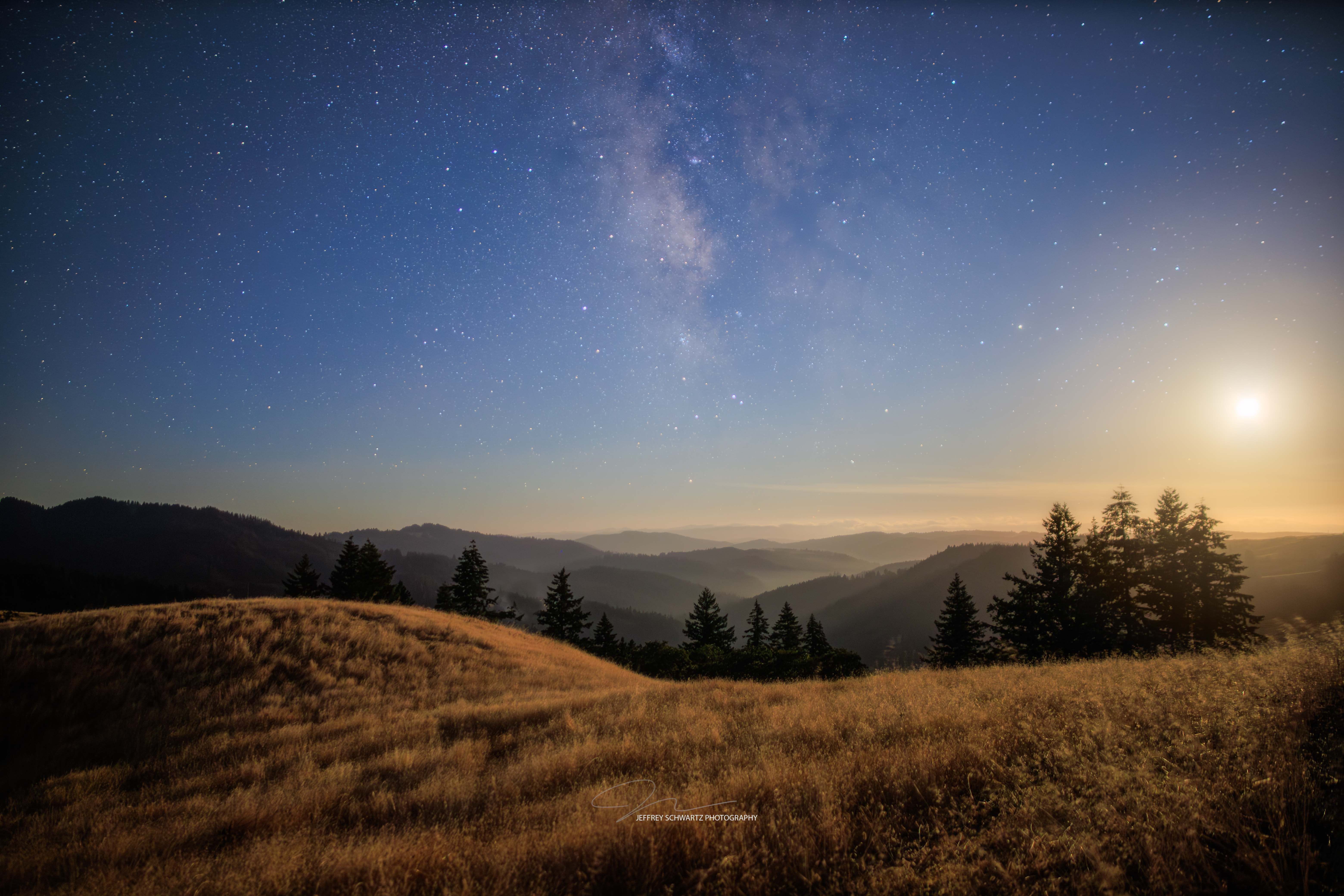 
        <div class='title'>
          image
        </div>
       
        <div class='description'>
          The Milky Way and the moon hovers over the hills near Kneeland Airport, California
        </div>
      