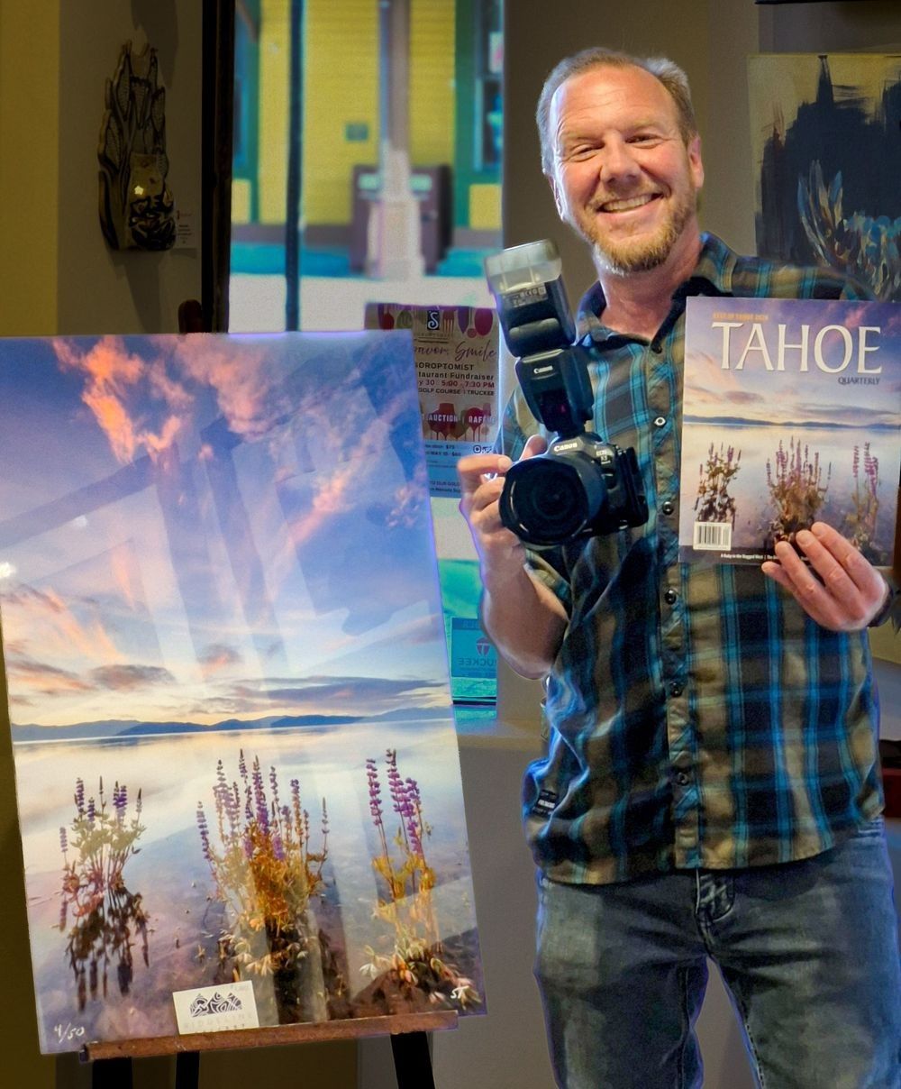 Scott Thompson with his photograph of the cover of the new Tahoe Quarterly, Best Of edition.