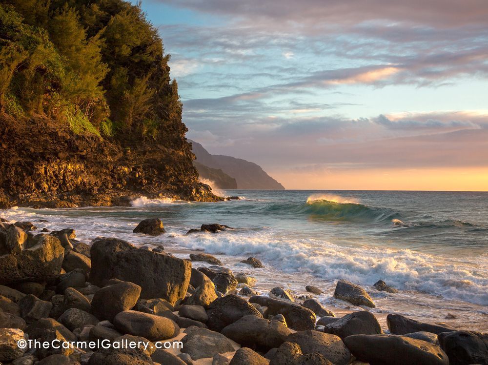 Sunset at Ke'e beach looking down the undeveloped rugged Napali coast