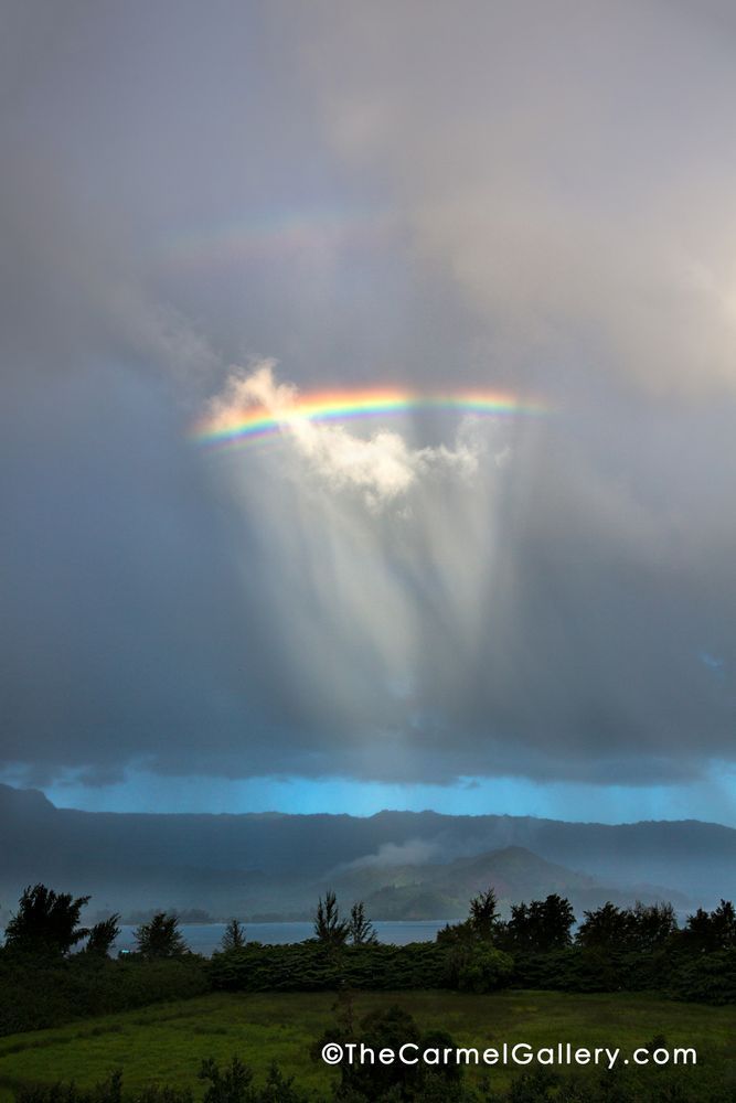 Morning rainbow over Hanalei Bay