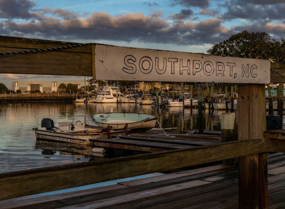 Welcome to Southport: A Harbor View – Coastal Sunset at the Dock | 910Photography