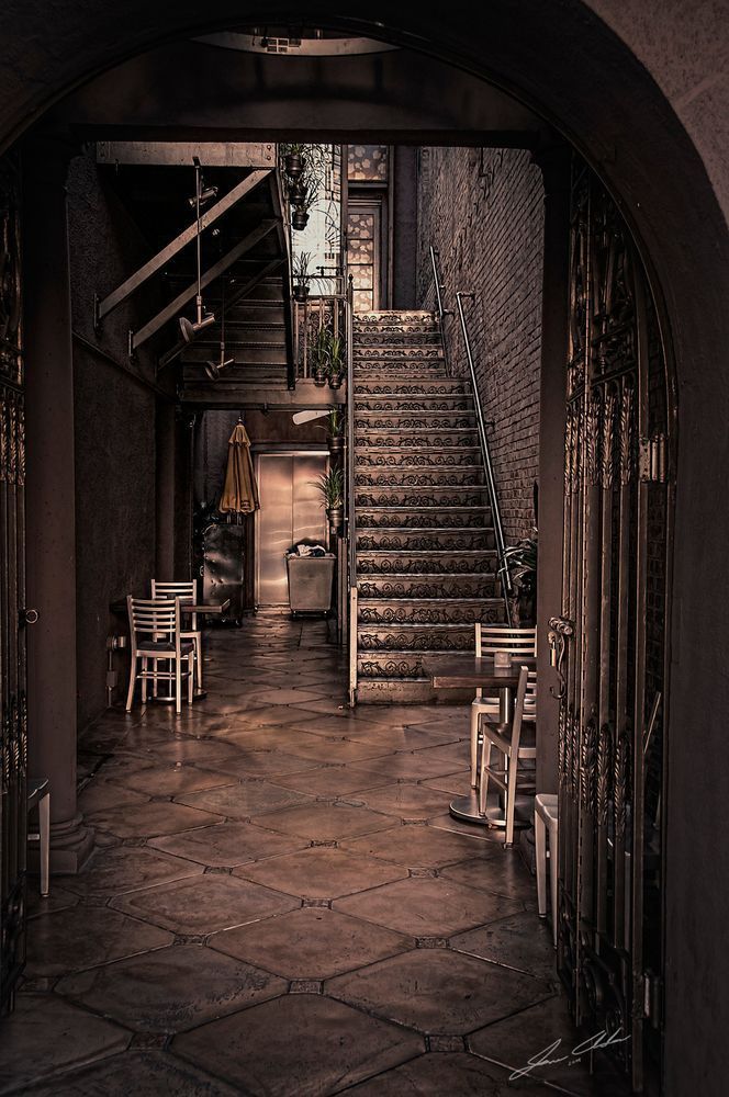 Urban Staircase and Chairs in a Moody Alley