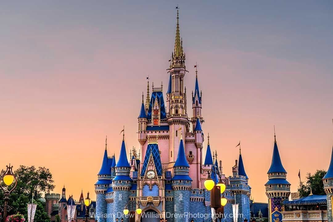 Cinderella Castle at Sunset Photograph when she was painted pink and blue for the 50th Anniversary - Photo by William Drew Photography