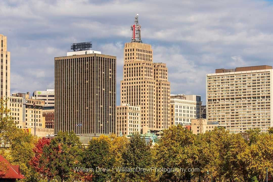 An autumn season view of the St. Paul, MN skyline from Harriet Island Regional Park by William Drew Photography