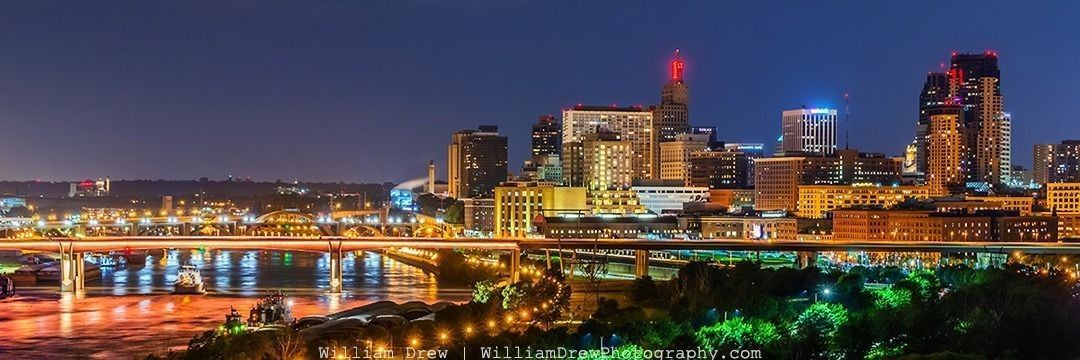 The Mississippi River and the St. Paul, MN skyline light up the night from this vantage point at Wicahapi Lookout - Photo by William Drew Photography