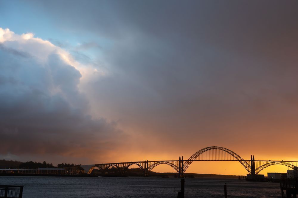 Stunning stormy sunset at Yaquina Bay Bridge photo by Barb Gonzalez Photography