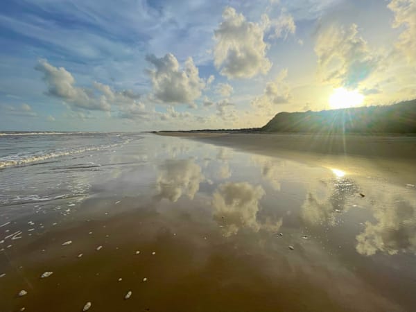 sunset reflection on beach