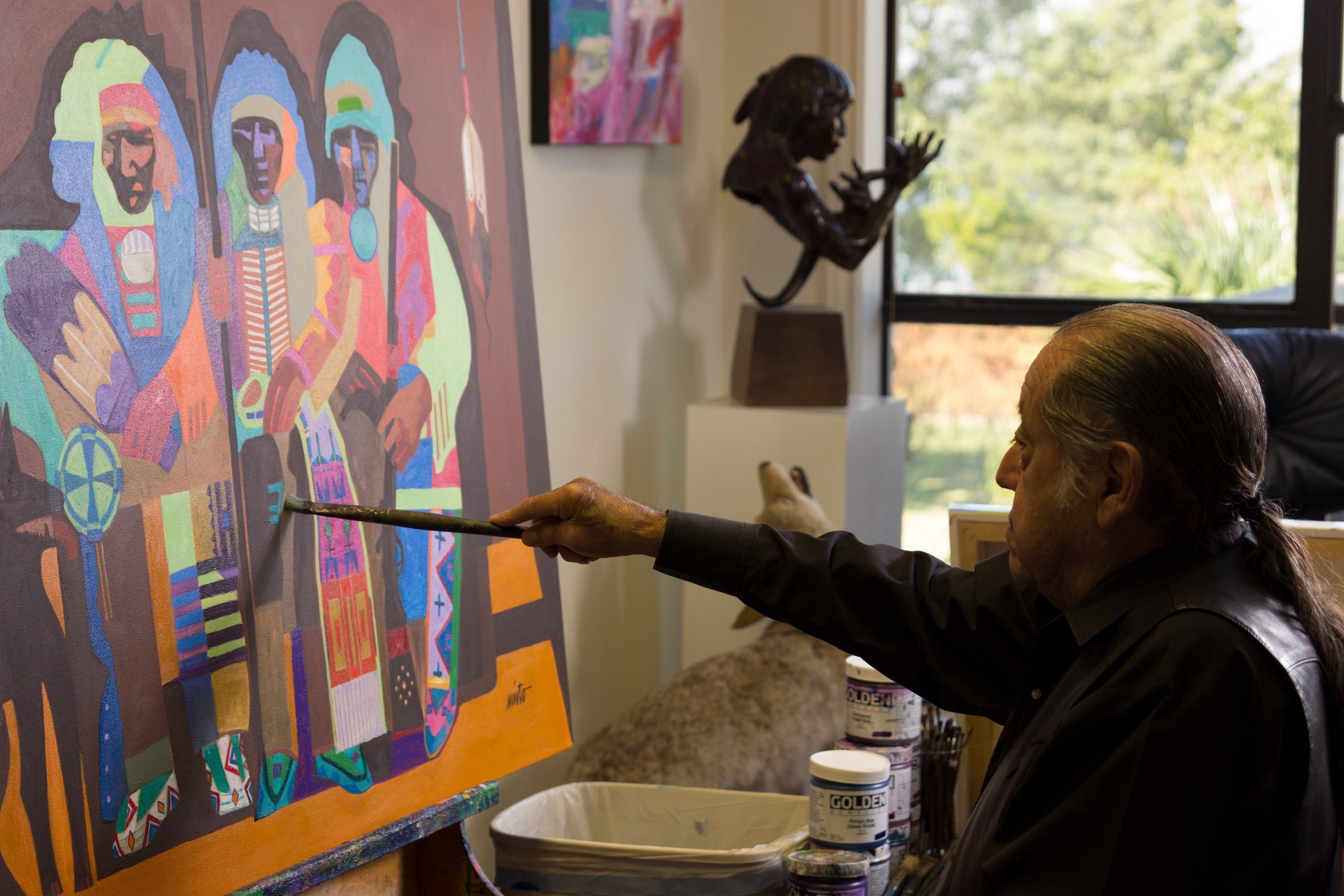 
        <div class='title'>
          John  Nieto painting, in the studio, acrylic painting, native american painting
        </div>
       
        <div class='description'>
          John Nieto painting in his studio
        </div>
      