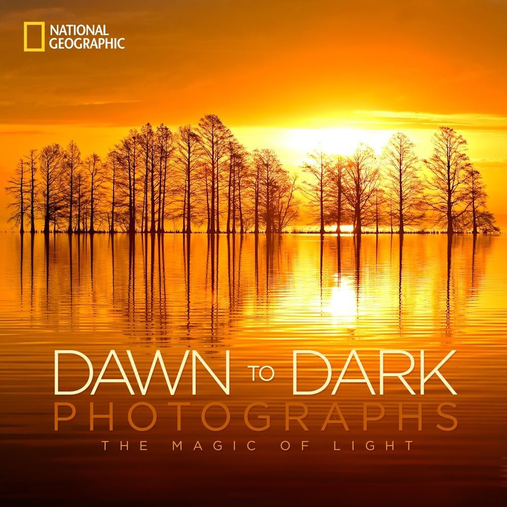 National Geographic Dawn to Dark book cover featuring Lake Mattamuskeet sunrise photograph by Robbie George