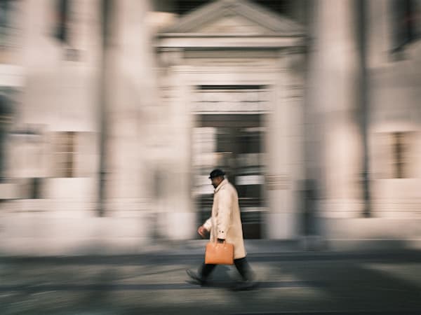 The Orange Briefcase – Elegant Motion Street Photography by Luis R.R. Siqueira