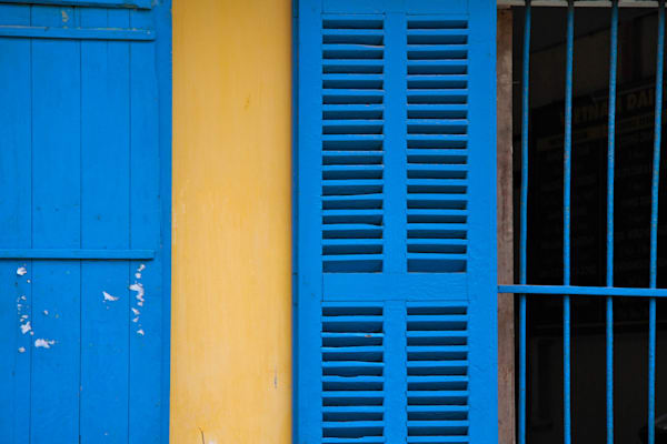 Yellow wall blue shutters 1