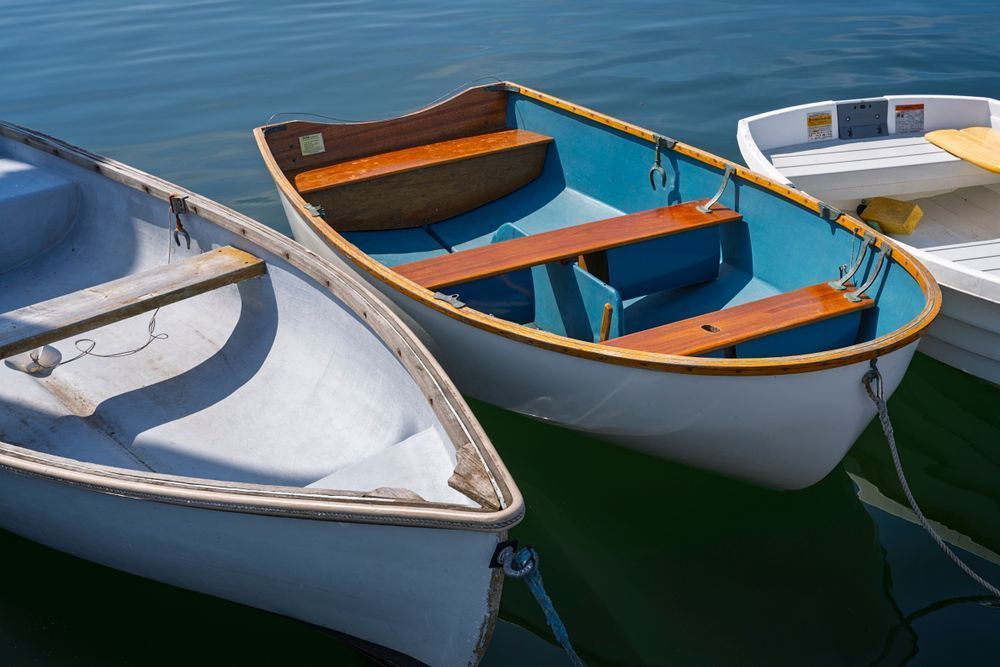 Blue Dinghy Among White Boats at Friendship Harbor