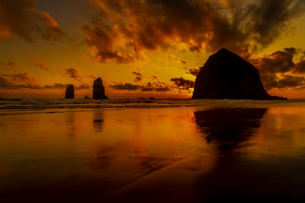 Sunset Dialogue At Cannon Beach: Haystack Shadows And Needle Reflections Photography Art | Harry Beugelink Photography