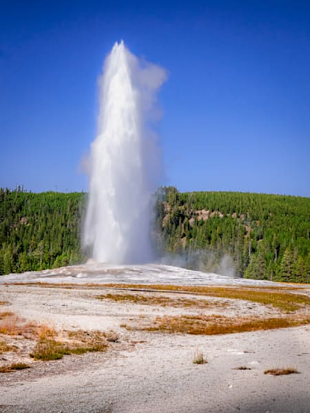Old Faithful’s Rising Column — A Vertical Dialogue Of Water And Blue Sky Photography Art | Harry Beugelink Photography
