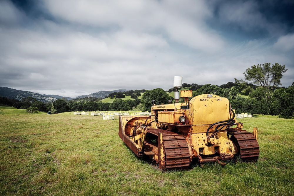 One of the earth-moving machines, necessary in the hills of a cattle ranch, sits idle at Pete's Valley Cattle ranch in Northern California.