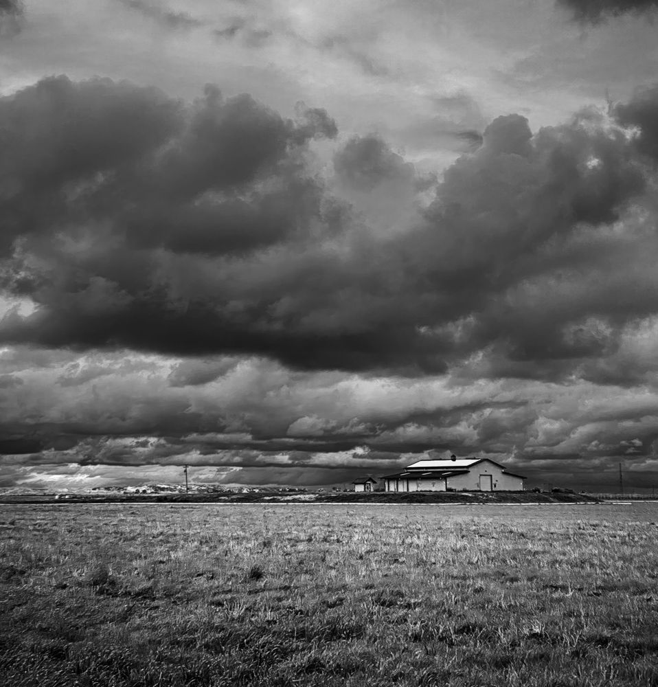 Rare snow clouds cross over Yolo County on their way to the Sierra Nevada range.