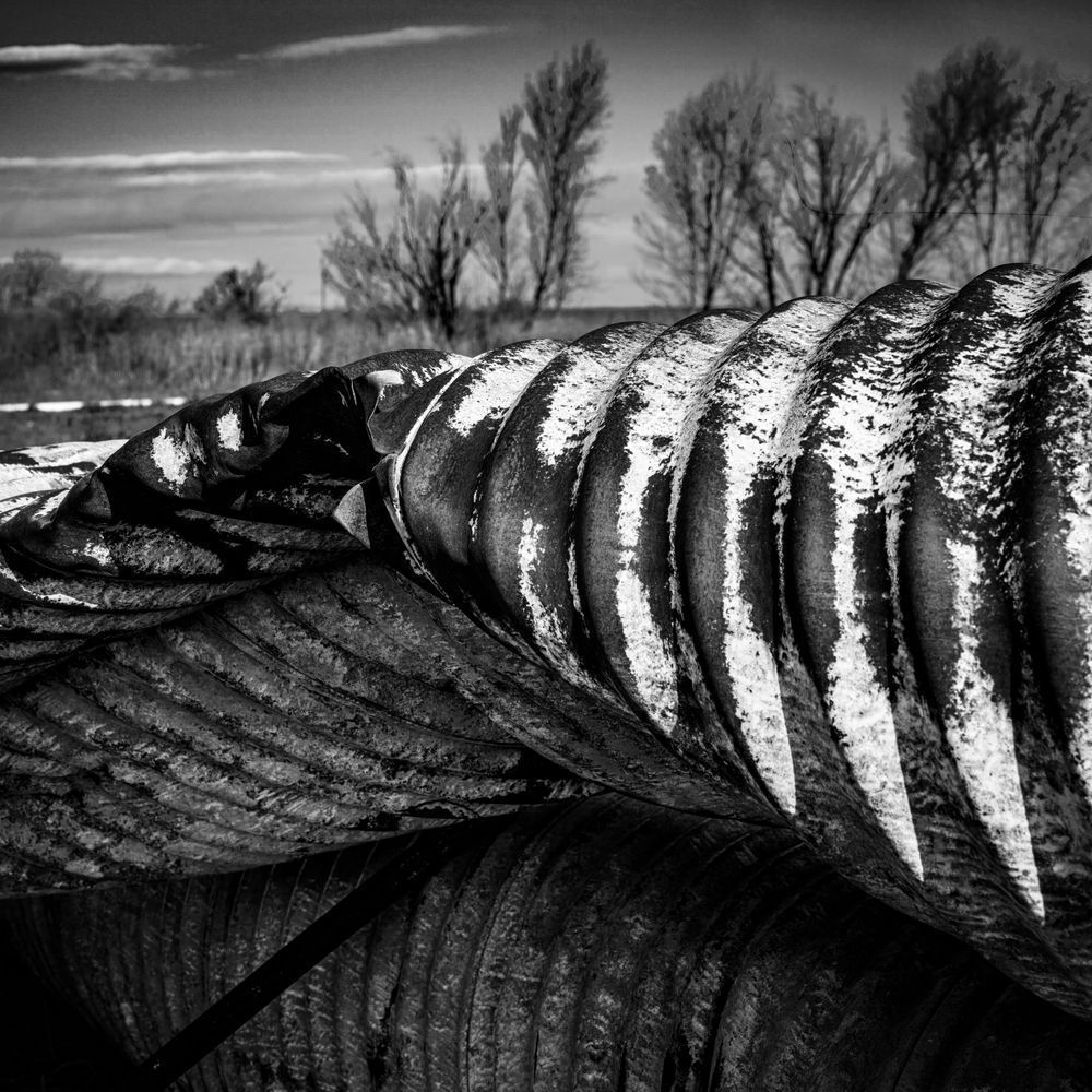 Massive farm equipment lies abandoned at the Carden Ranch in Yolo County, California.
