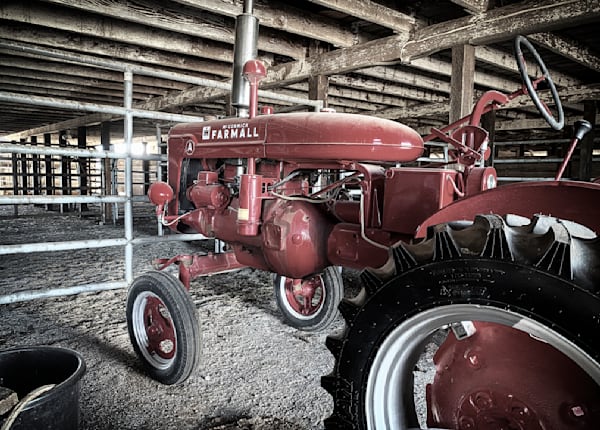 A new tractor is housed in the main barn at Pheasant Trek Ranch in Yolo County, California.
