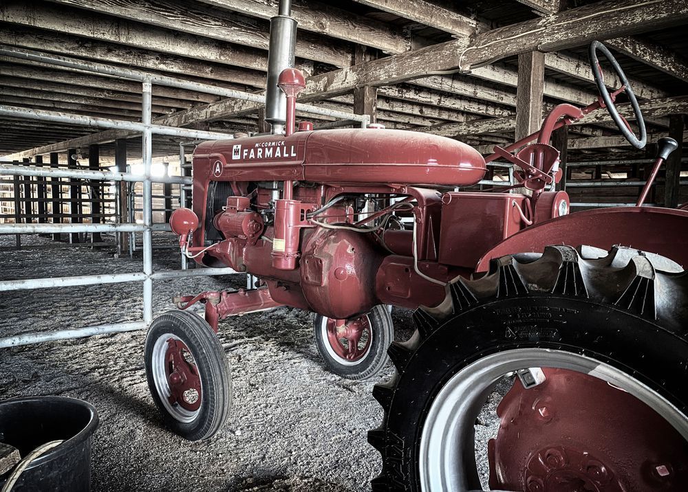 A new tractor is housed in the main barn at Pheasant Trek Ranch in Yolo County, California.