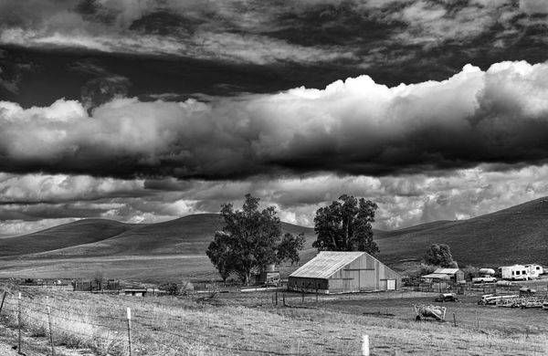 Winter storm clouds loom over Slaven Sheep Ranch in Yolo County, California.
