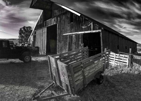 Morning lights sets off the textures of a barn and trailer at Slaven Sheep Ranch.