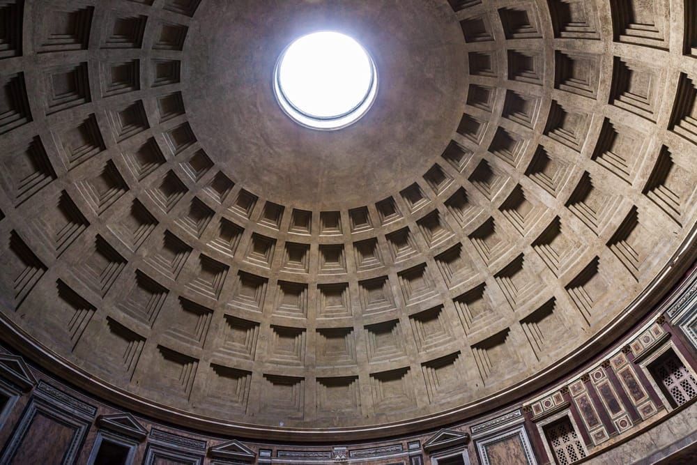 Looking up at the interior domed ceiling inside the Pantheon, Rome, Italy.