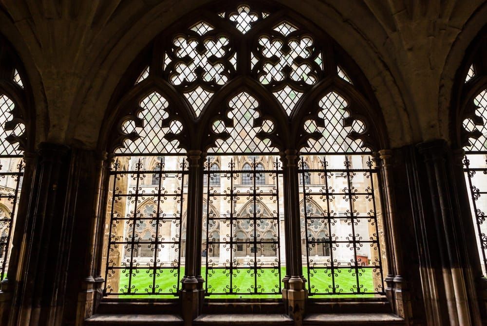 A window detail within Westminster Abbey along an interior courtyard, London, England.