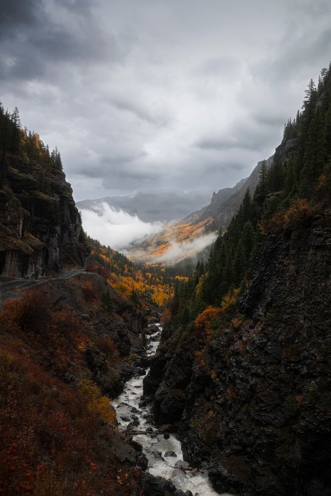 The Kingdom - Autumn colors in Fall weather as viewed through a beautiful mountain pass in the San Juan Mountains of Colorado.