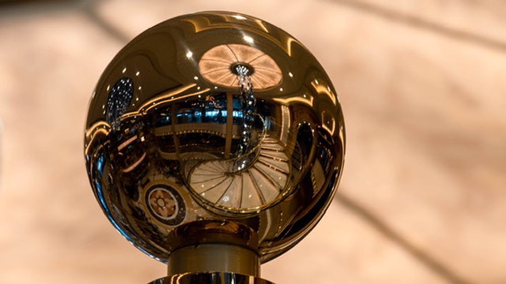 Cruise Ship Atrium Reflection in Brass Finial | Abstract Luxury Interior Photography