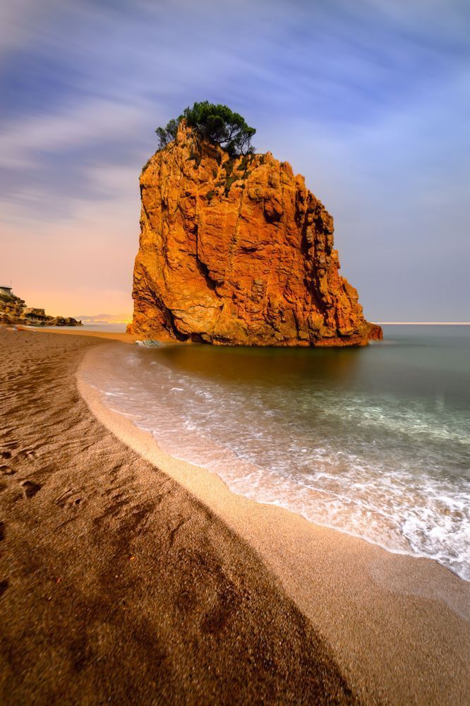 Red Rock at Dawn - Unique seascape with controlled lighting and strong composition