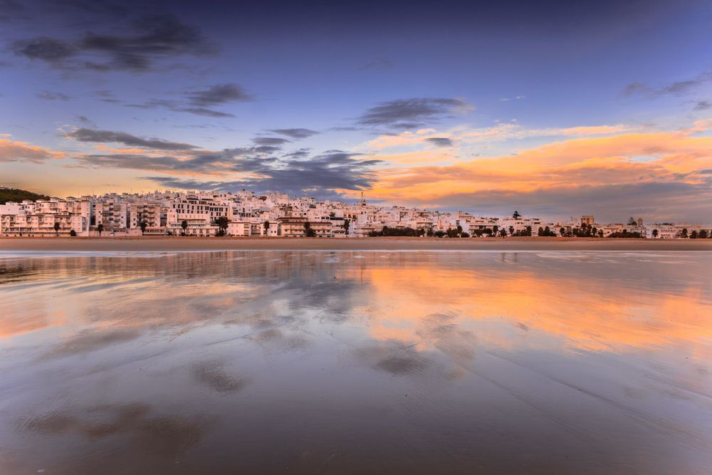 Reflections of Calm - Coastal wall art capturing calm water and warm evening light - Conil de la frontera, Andalusia, Spain 2006