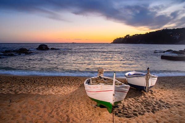 The Last Light on the Beach - Beach scene with warm tones and softly illuminated foreground