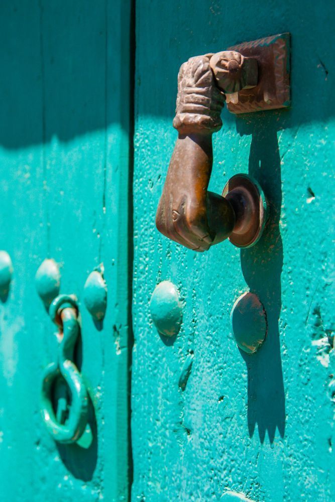 The Door Hand - A detailed composition with natural light and strong presence