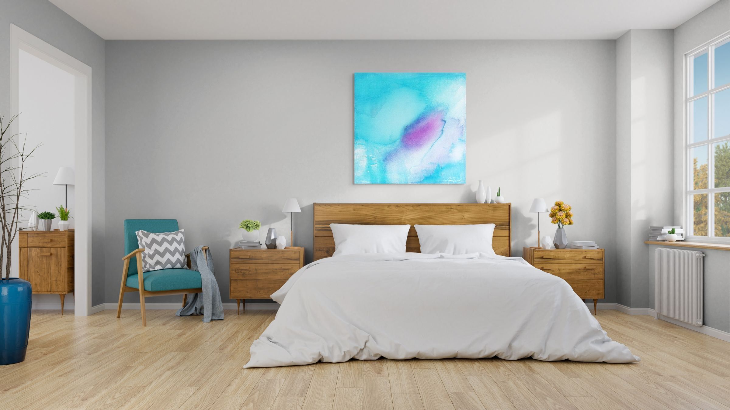 Messenger 3 open edition fine art print by Anne Reid Artist — turquoise ground with soft rose-violet feather form, shown above a bed in a bright airy bedroom with oak furniture, white bedding, and a teal accent chair.