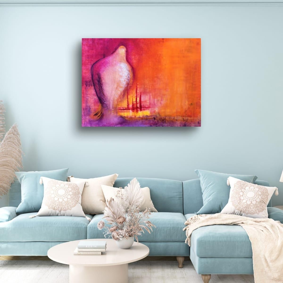 Falcon, print by Anne Reid Artist shown above a pastel sofa in a warm boho living room setting.