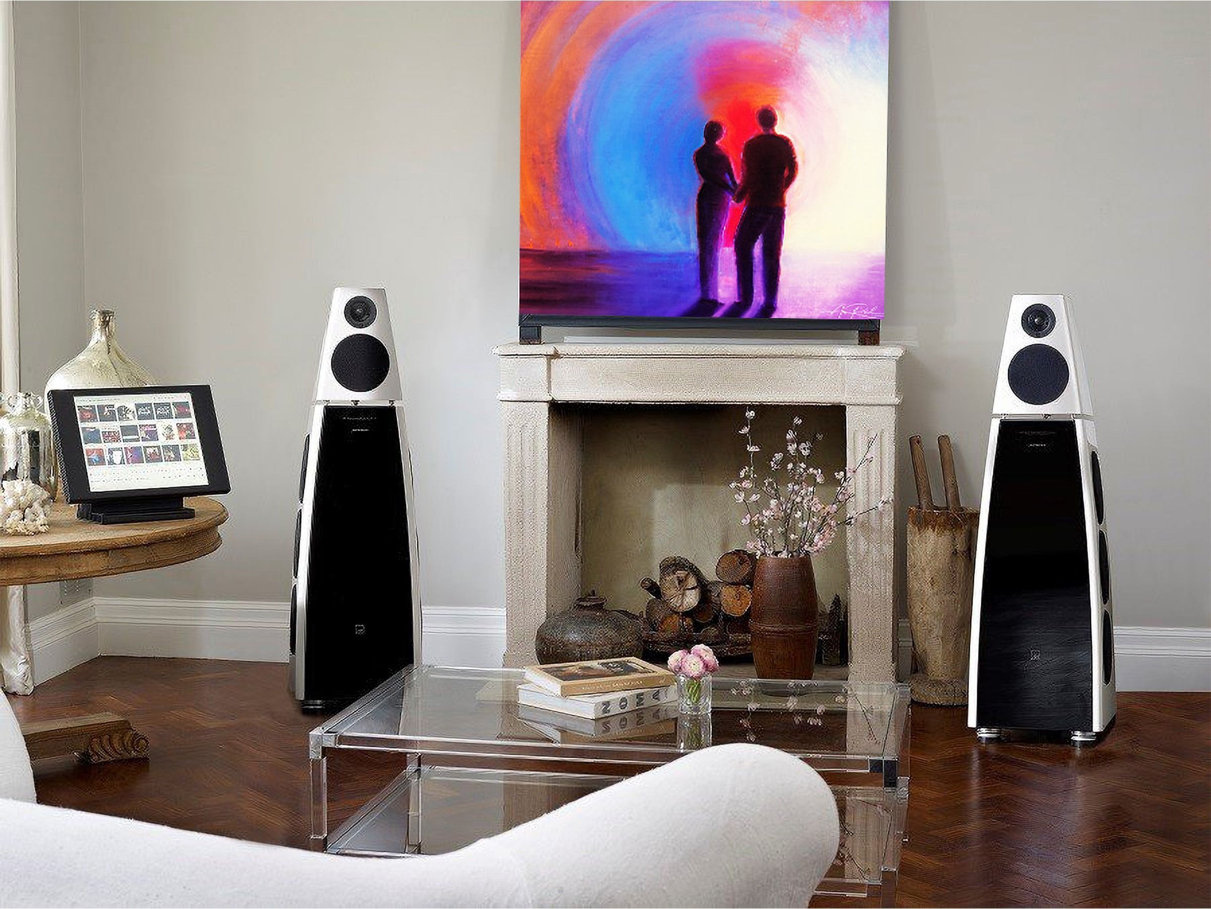 Two 5, metal wall art by Anne Reid Artist shown above a fireplace in a listening room setting.