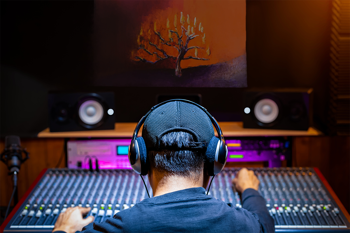 Burning Bush 3, metal print by Anne Reid Artist shown above a recording console in a studio setting