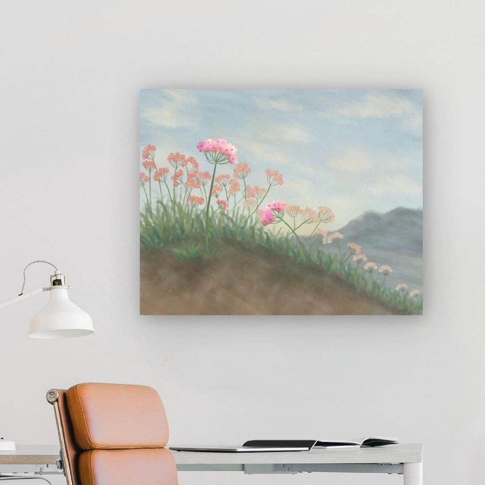 Drift, a minimalist desert wildflower painting hangs on the wall in an office space.